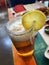 Light beer with lemon served in mason jar