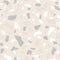 Light beige background with colored stones. Terrazzo seamless pattern. Vector