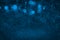 Light blue beautiful brilliant glitter lights defocused bokeh abstract background with sparks fly, holiday mockup texture with