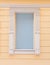 Light blue built window with white frame