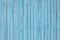 Light blue colored vertical wood planks background texture