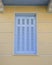 Light blue french style window shutters closeup