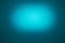 Light blue oval cloud of light on a dark turquoise background