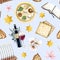 Light blue Passover seamless pattern with seder Pesach food, kosher wine, Haggadah, flowers, matzah, stars of David