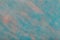 Light blue and pink background of felt fabric. Texture of woolen textile