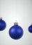 Light blue round matt Christmas ball. Christmas ornament standing on blue background