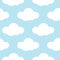 Light blue sky with white clouds seamless background