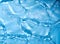light blue transparent clear calm water surface texture