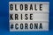 A light box with the inscription: GLOBALE  #CORONA