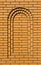 Light brown arched concave brick wall background