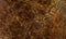 Light brown marble, chaotic rugged dark brown and beige stripes. Natural materials for interior decoration. Natural stone for use