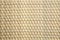 Light brown woven plastic background
