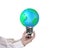 Light bulb of globe shape with man\'s hand holding