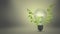 The light bulb and green branch with leaves, eco friendly power source