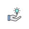 Light bulb in hand filled outline icon