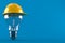 Light bulb with hardhat