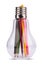 Light bulb with many colored pencils inside on white