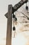 Light bulbs in the street in daylight. A garland of light bulbs on a wooden pedestal in the afternoon in the sun outdoor