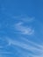 Light cirrus clouds in the endless blue sky