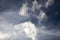 Light Clouds Illuminated In Front Of Storm Clouds Forming