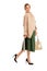 Light color coat, green skirt and black shoes with high heels