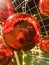 Light colored ball decorated with Christmas. Beautiful furnished fireplace. Red Christmas balls and tinsel