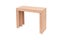 Light colored wooden transforming table