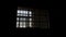 Light Coming in Through Prison Cell Bars Window. Empty Jail Cells. Prison Interior.