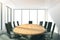 Light conference room with oval wooden table