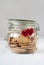 Light Cookies in the Jar Decorated with Two Red Hearts