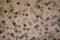 Light and dark brown mini mosaic tiles