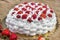 Light, delicate and tasty cream cake with fresh strawberries