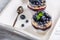 Light dessert of chia pudding with blueberry, oats and fresh jam.