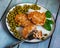 Light diet breakfast of chum salmon cutlets with green peas and a fork