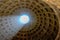 Light in the dome of the Pantheon in the city of Rome. Italy
