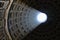 Light in the dome of the Pantheon in the city of Rome. Italy