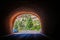 The light at the end of the Tunnel at south end of Zion National Park Showing bright light and trees and cliffs and a few cars