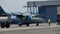 Light-Engine Propeller Aircraft with a Rotating Propeller Stands at the Hangar