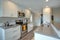 Light filled kitchen with stainless appliances