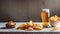 Light foamy beer, potato crisps on wooden background, chips snack and cold bar beverage, food and drink