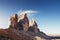 Light fog on the top of the hills begins to descend. Tre Cime three peaks mountains