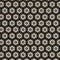 Light geometric linear lace fabric pattern on a black background