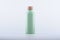 Light green aluminium cosmetic bottle with copper color cap