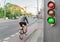 Light with green bicycle sign, road safety and transportation in the city concept