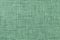 Light green textile background closeup. Structure of the fabric macro