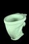 The light green toilet bowl