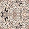 Light kaleidoscope seamless texture with many ornaments, light orange and white