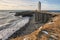 Light lighthouse on promontory