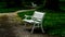 A light metal wooden bench in the park