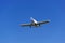 A light motor plane on a blue sky